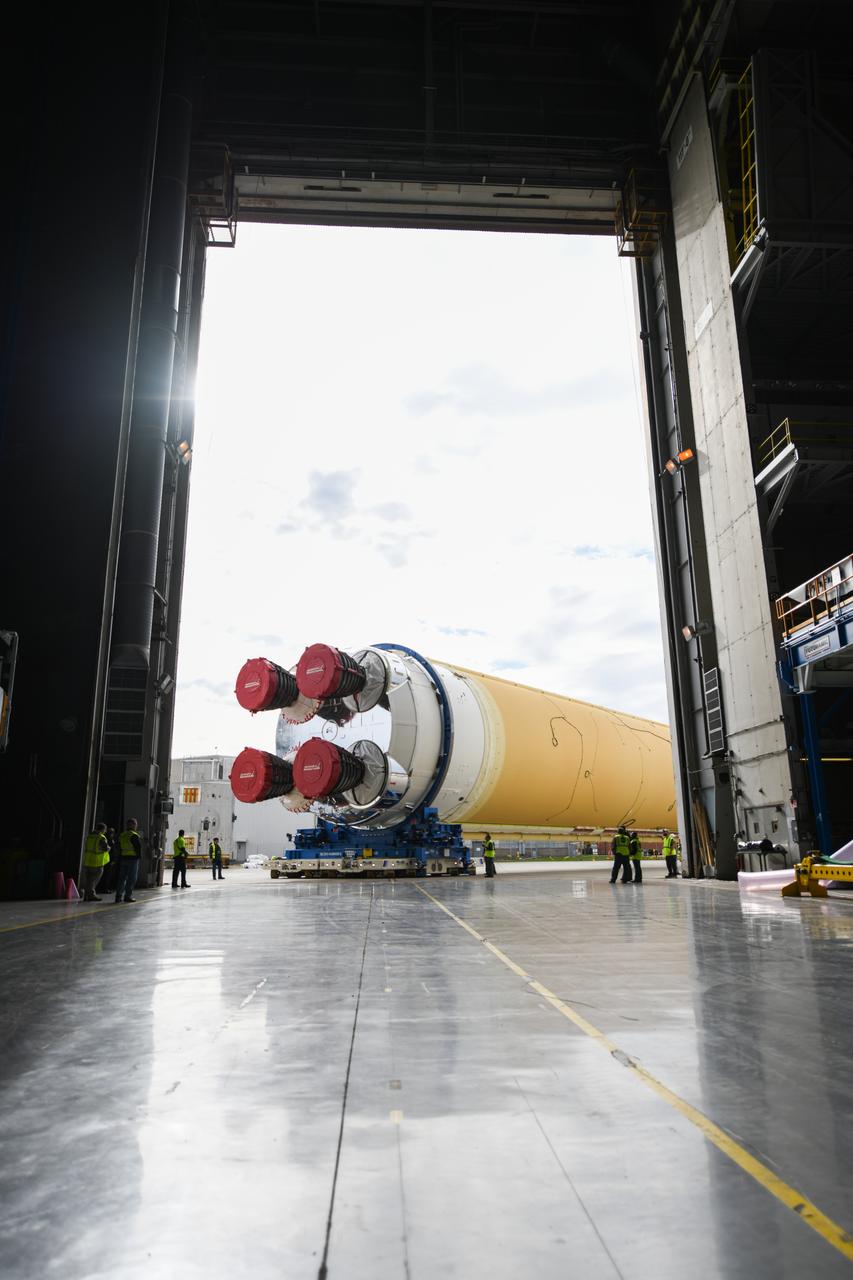 These images show how teams at NASA’s Michoud Assembly Facility in New Orleans moved the core stage, complete with all four RS-25 engines, for NASA’s Space Launch System (SLS) rocket to Building 110 for final shipping preparations on Jan. 1. The SLS core stage includes state-of-the-art avionics, propulsion systems and two colossal propellant tanks that collectively hold 733,000 gallons of liquid oxygen and liquid hydrogen to power its four RS-25 engines. The completed stage, which will provide more than 2 million pounds of thrust to help power the first Artemis mission to the Moon, will be shipped via the agency’s Pegasus barge from Michoud to NASA’s Stennis Space Center near Bay St. Louis, Mississippi, later this month. Once at Stennis, the Artemis rocket stage will be loaded into the B-2 Test Stand for the core stage Green Run test series. The comprehensive test campaign will progressively bring the entire core stage, including its avionics and engines, to life for the first time to verify the stage is fit for flight ahead of the launch of Artemis I.